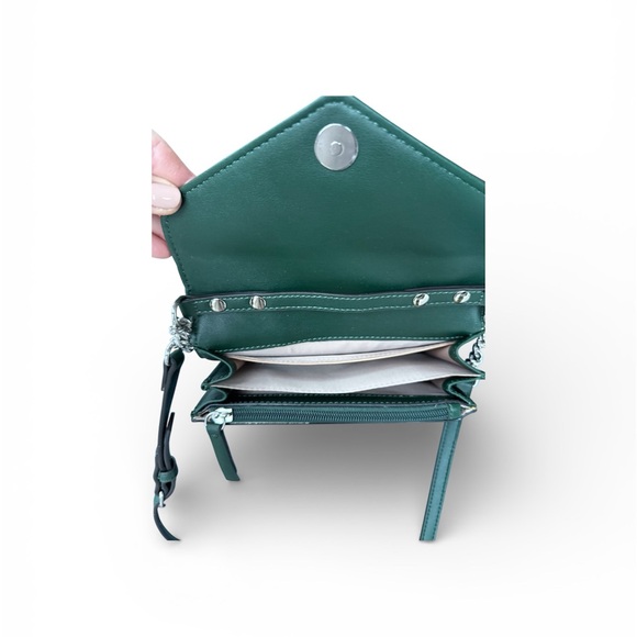 Stunning 9 West crossbody purse. Brand new.
Holds everything you need! - Picture 4 of 6